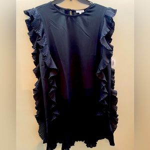 Classy little black dress with ruffles. The dress that is always noticed.